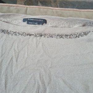 Embellished sweater dresses